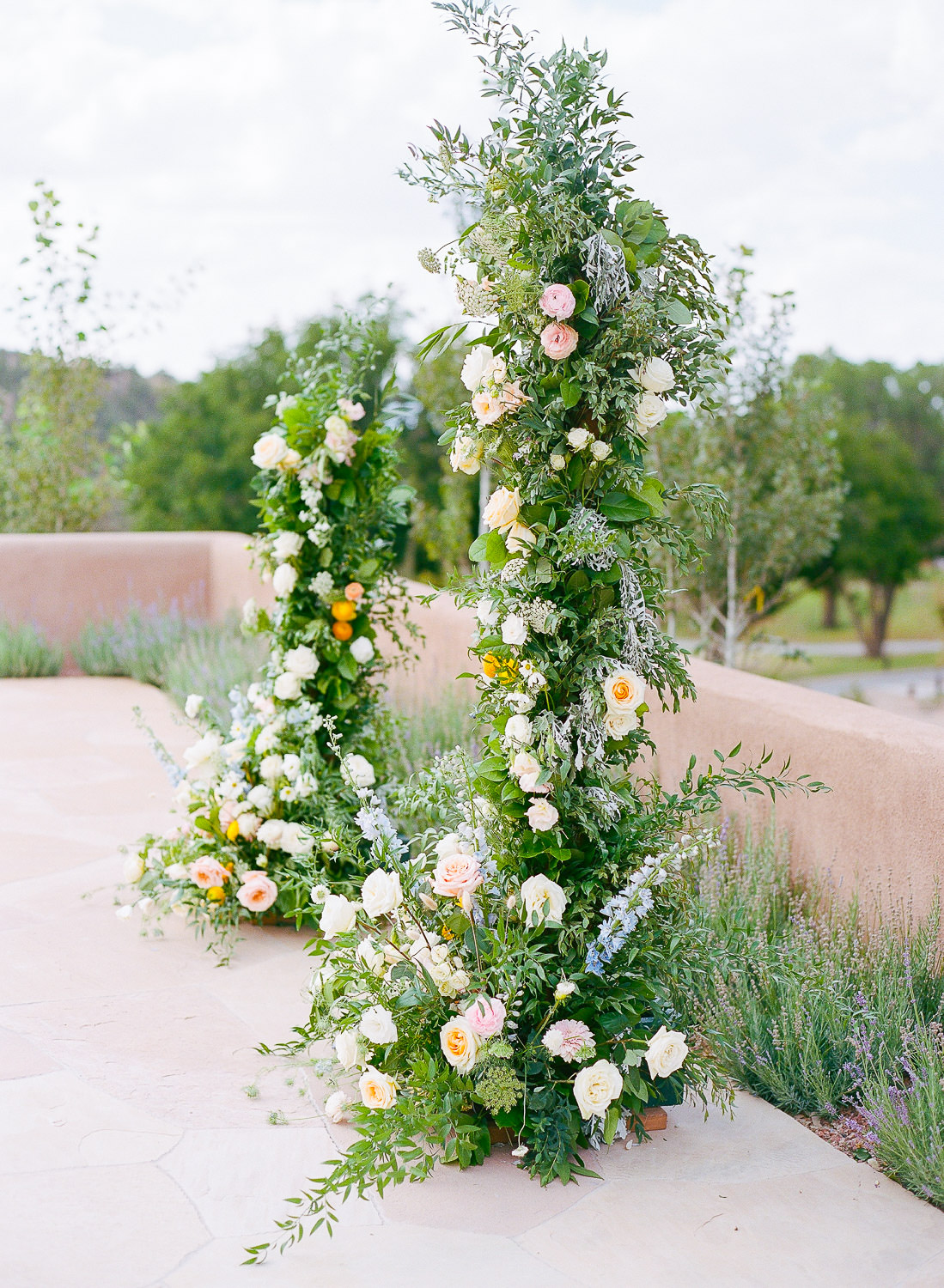 Close up of a floral wedding arch.
